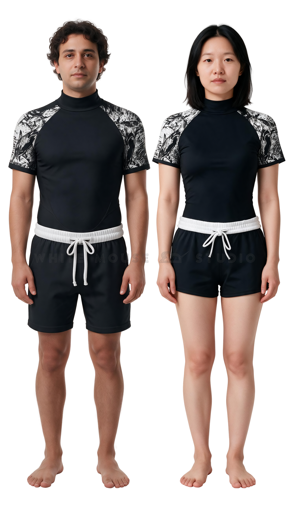 Man and woman wearing the black short sleeve hammerhead shark water sports staff uniform, front view