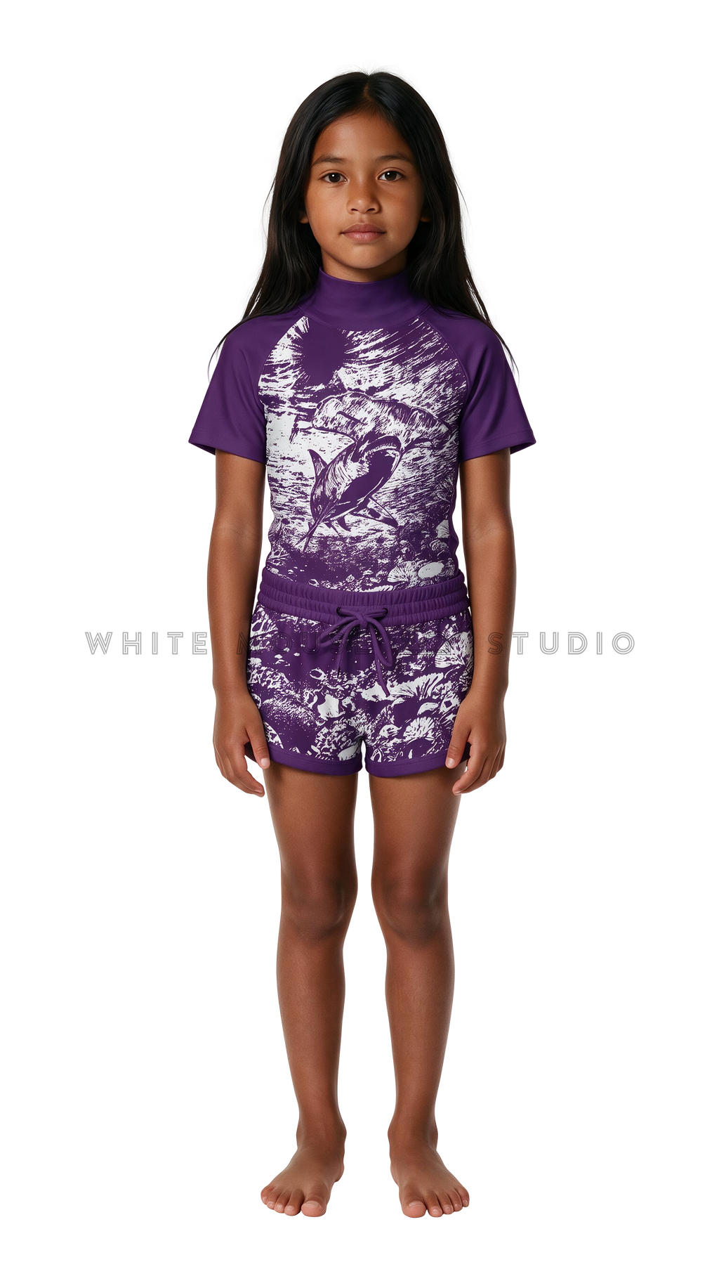 Girl wearing short-sleeve swimwear with purple hammerhead shark print