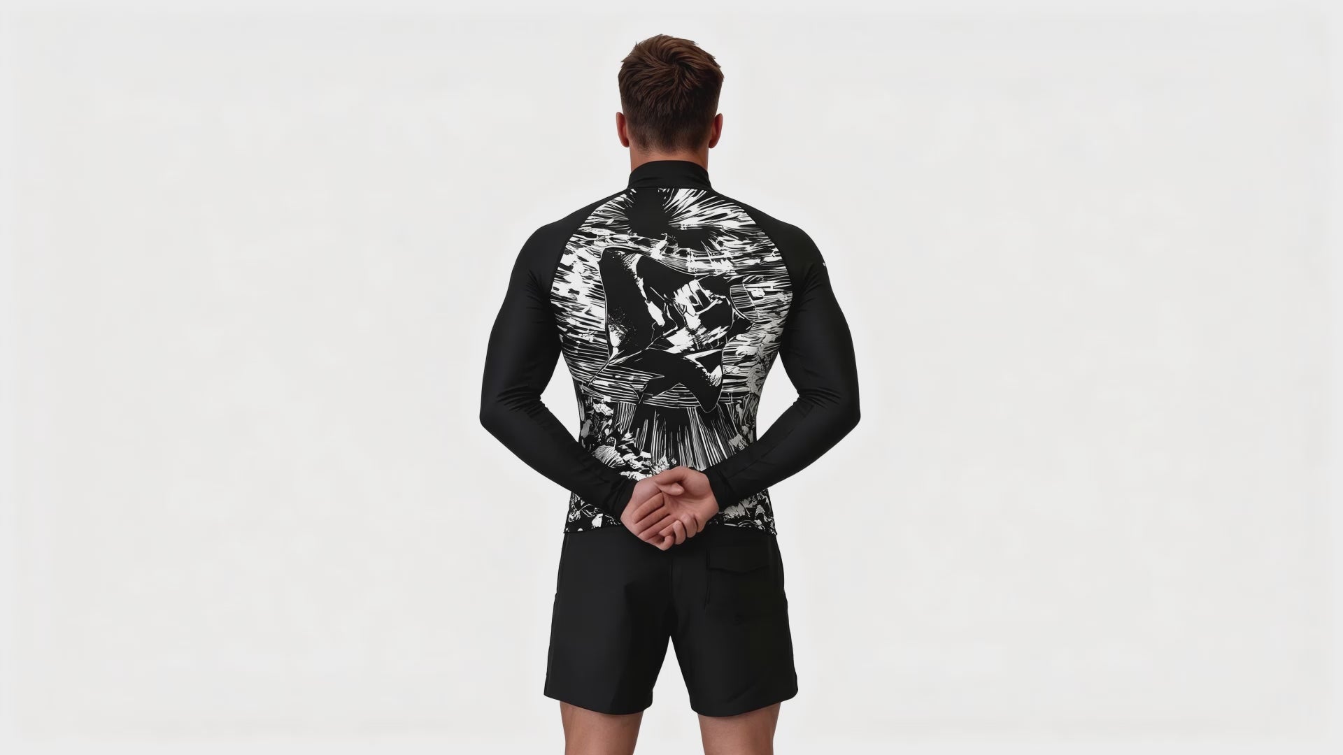 Black manta print rash guard and boardshorts swim set